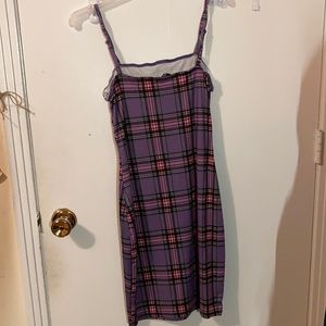 Perfect condition purple plaid bodycon dress. It’s from shein and a size small.